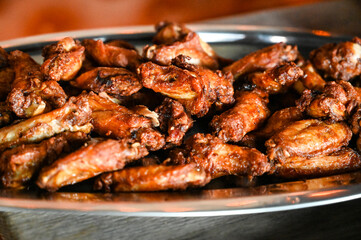 Chicken meat. Grilled chicken wings.