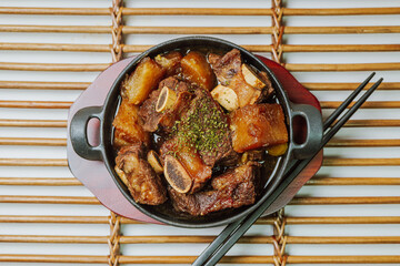 galbijjim, Korean Braised Short Ribs : Beef short ribs, trimmed of fat, seasoned in sweet soy...