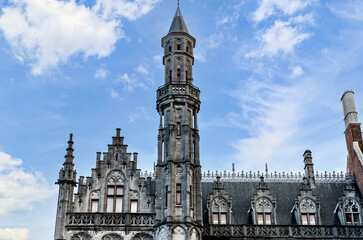 Fototapeta na wymiar Views of the Historium tower on the market square in Bruges, Belgium