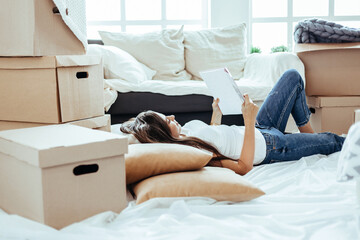 young woman looking at the design of her new apartment.