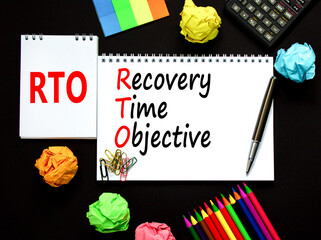 RTO recovery time objective symbol. Concept words RTO recovery time objective on white note on a...