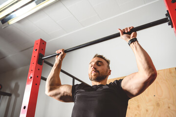 portrait of a male fitness workout in the modern gym