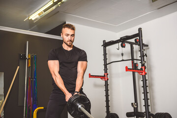 portrait of a male fitness workout in the modern gym