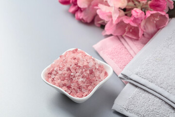 Spa composition with pink Himalayan salt.