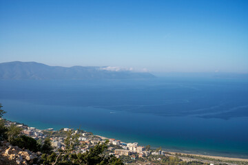 Fototapeta na wymiar Attractive spring cityscape of Vlore city from Kanines fortress. Captivating sunset sescape of Adriatic sea. Spectacular outdoor scene of Albania, Europe. Traveling concept background.