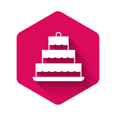 White Cake with burning candles icon isolated with long shadow background. Happy Birthday. Pink hexagon button. Vector