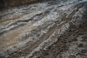 Dirty country road in autumn