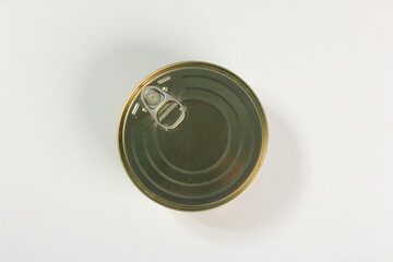 Many closed tin cans on white background. metal cans for fish and meat products