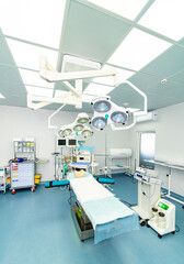 Professional operating treatment. Modern hospital room with new technology equipment.