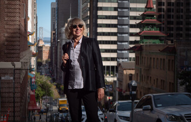 Fototapeta premium Business senior woman walking at San Francisco down town area