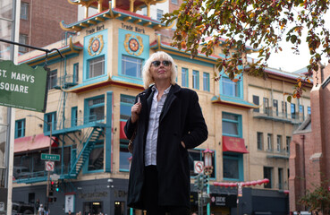 Business senior woman walking at San Francisco down town area
