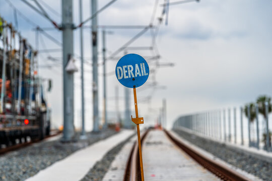 Railroad construction derail sign on a cloudy day with space for copy