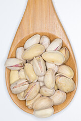 pistachios ready to eat on white background