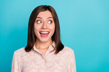Fototapeta premium Close up photo of nice young girl look impressed empty space dressed stylish smart casual outfit isolated on aquamarine color background
