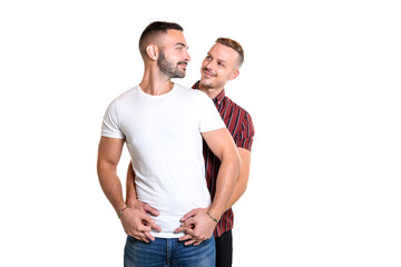 Two young men couple over white background on studio