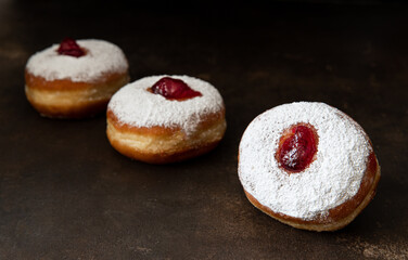 Jewish holiday hannukah symbols - donuts with jam	