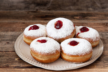 Jewish holiday hannukah symbols - donuts with jam	