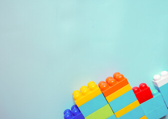 toy blocks on turquoise background