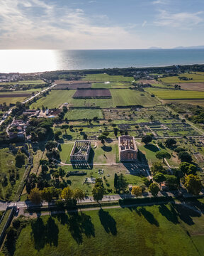Aerial view of Temple of Hera and Poseidon, an ancient ruined temple and amphitheater in Paestum, Salerno, Campania, Italy.