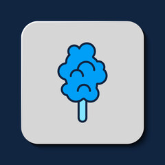 Filled outline Cotton candy icon isolated on blue background. Vector