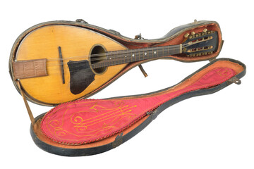 An old mandolin with case isolated on white background