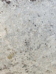 Natural white speckled marble/rock/stone surface material texture with grey black speckles detail