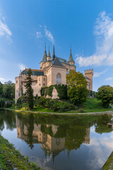 Fototapeta na wymiar view of the Bojnice Castle with reflections in the moat