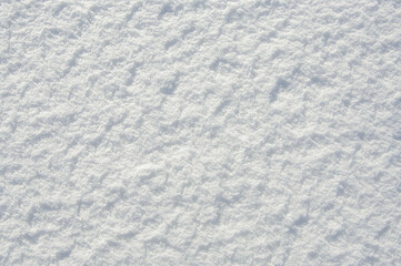 Obraz premium Snow texture with shadow for design. White texture. View from above.