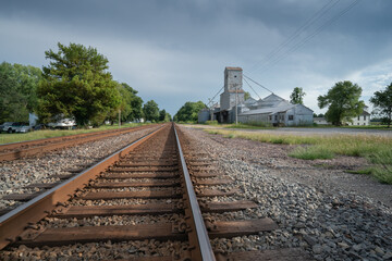Fototapeta na wymiar Railroad tracks and grain elevator at Ware, Illinois