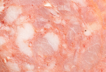 Smoked krakow sausage texture background close-up