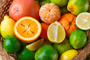 Assortment, citrus fruits, in a basket, close-up, top view, no people,