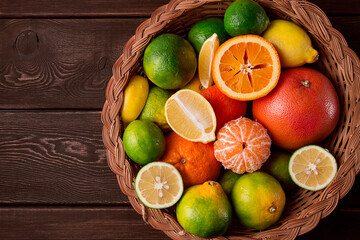 Assortment, citrus fruits, in a basket, close-up, top view, no people,