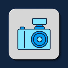Filled outline Photo camera icon isolated on blue background. Foto camera. Digital photography. Vector