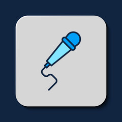 Filled outline Microphone icon isolated on blue background. On air radio mic microphone. Speaker sign. Vector