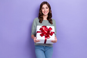 Fototapeta premium Photo of adorable cute lady dressed stylish clothes hands hold holiday box go meeting close friend isolated on purple color background