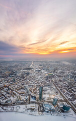 Yekaterinburg city with Buildings of Regional Government and Parliament, Dramatic Theatre, Iset Tower, Yeltsin Center, panoramic view at winter sunset.