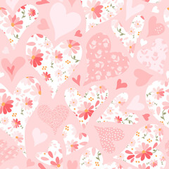 Cute seamless pattern with hearts with flowers for Valentines day.