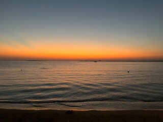 Beautiful orange sea horizon, evening beach