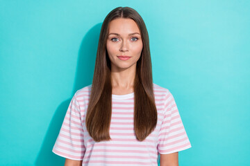Photo of pretty gorgeous nice girl with straight hairdo dressed striped t-shirt confident look at camera isolated on teal color background