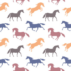 Seamless vector pattern with colorful running horses. Graphic print for children