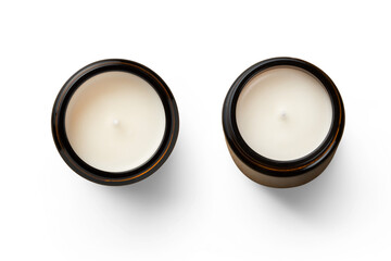 two unused white hand-poured soy wax scented candles in brown glass jars - isolated design elements...