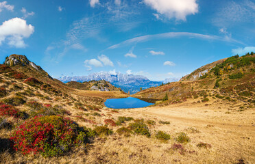 Autumn alpine Kleiner Paarsee or Paarseen lake, Land Salzburg, Austria. Alps Hochkonig rocky mountain group view in far.