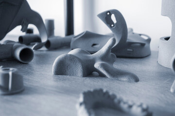 Prototype model part of human bone printed on powder 3D printer close-up. Figure printed on 3D...