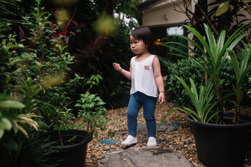 Little girl in backyard