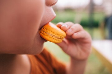 Boy eat macaron