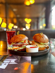 Two burgers in the plate