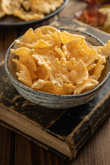 Halloween crispy bat shaped chips in bowl.