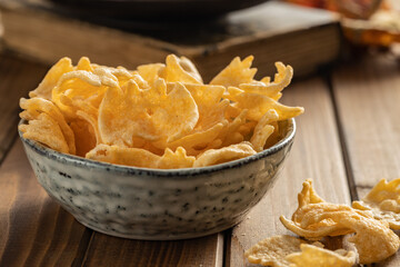Halloween crispy bat shaped chips in bowl.