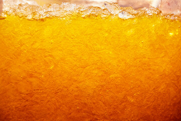 Close up of ice in a glass of ice tea for background. 