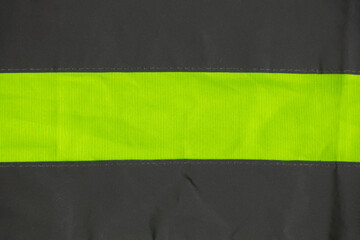 Reflective vest close-up as a background, carefully, uniform